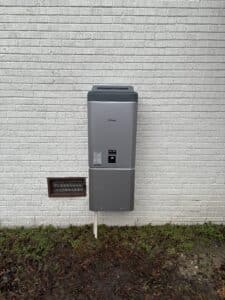 Rinnai RXP199 installed on brick wall