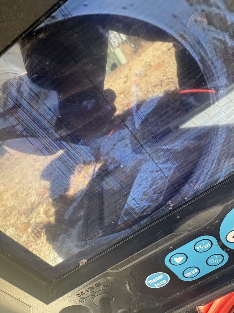 DETAIL — camera inspection showing the broken tee | Sewer camera inspection screen showing a broken cleanout tee in Wake Forest, NC |