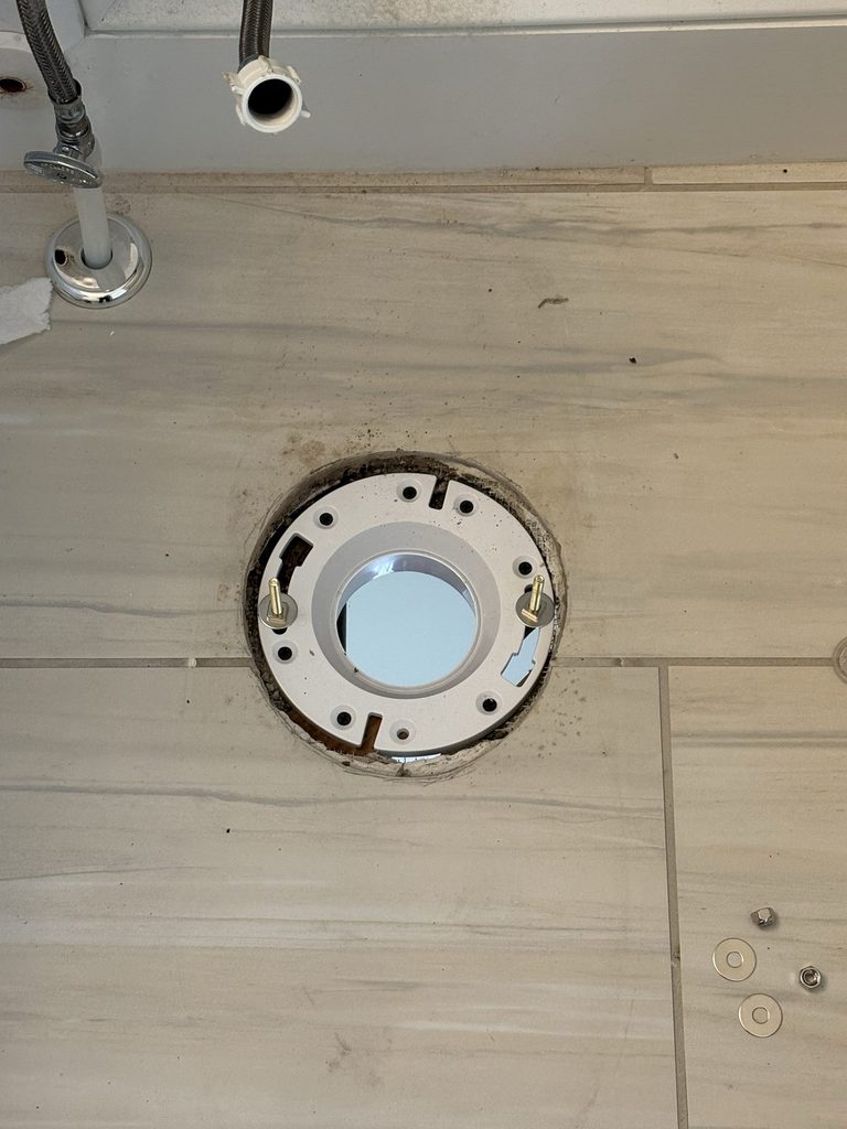 DURING — new flange installed | New toilet flange installed by ARC Plumbing in a Raleigh, NC bathroom |