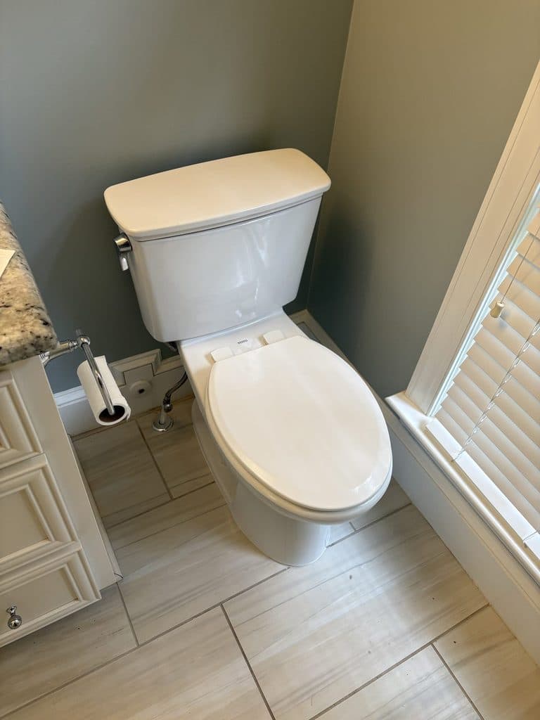 AFTER — toilet reset on a new wax ring | Toilet reset on a new flange and wax ring after a leak repair in North Ridge, Raleigh, NC |