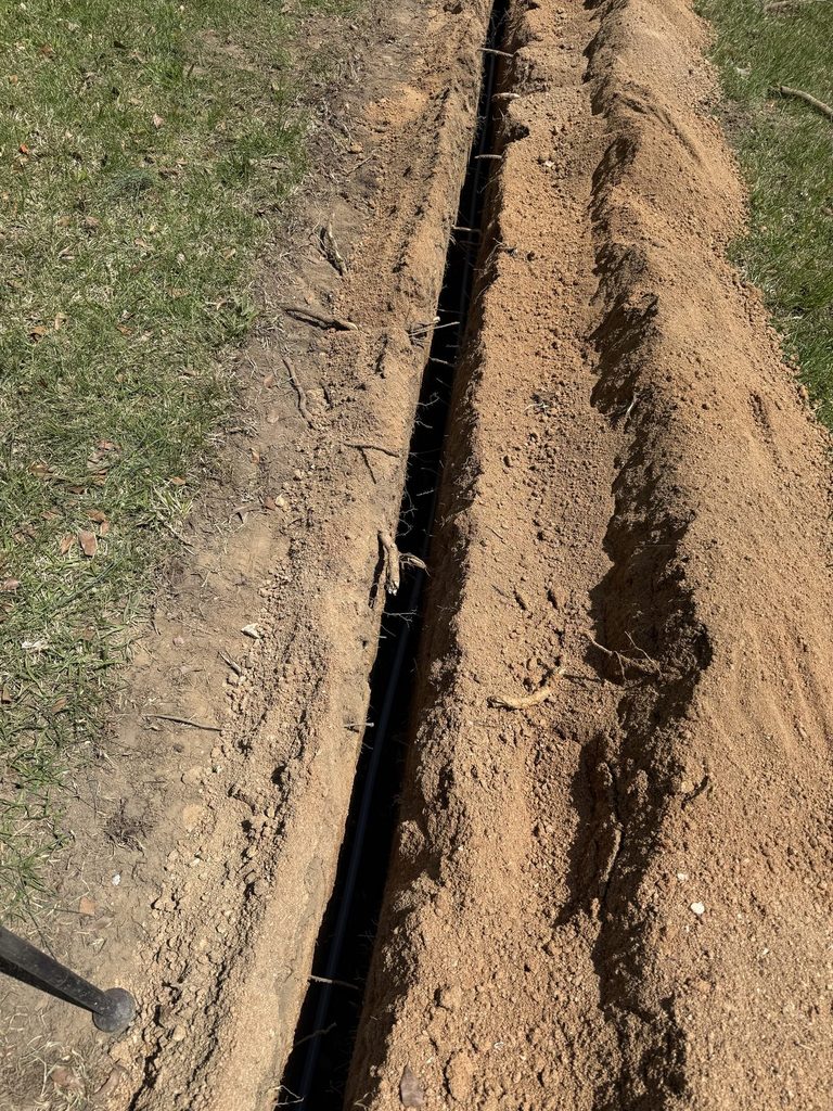 DURING — new PEX-A water line in the trench | New PEX-A water service line laid in a trench in Raleigh, NC