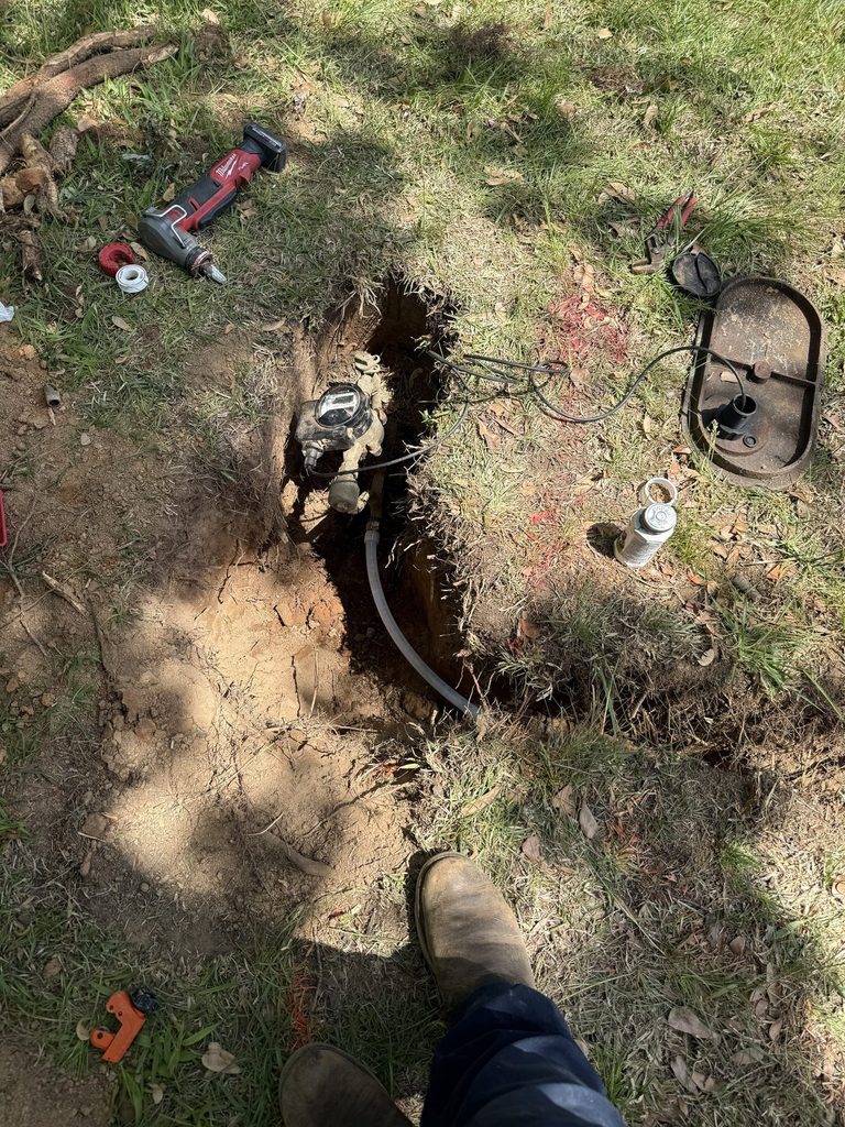 DURING — tying in at the meter box | ARC plumber connecting a new water line at the meter box in Raleigh, NC