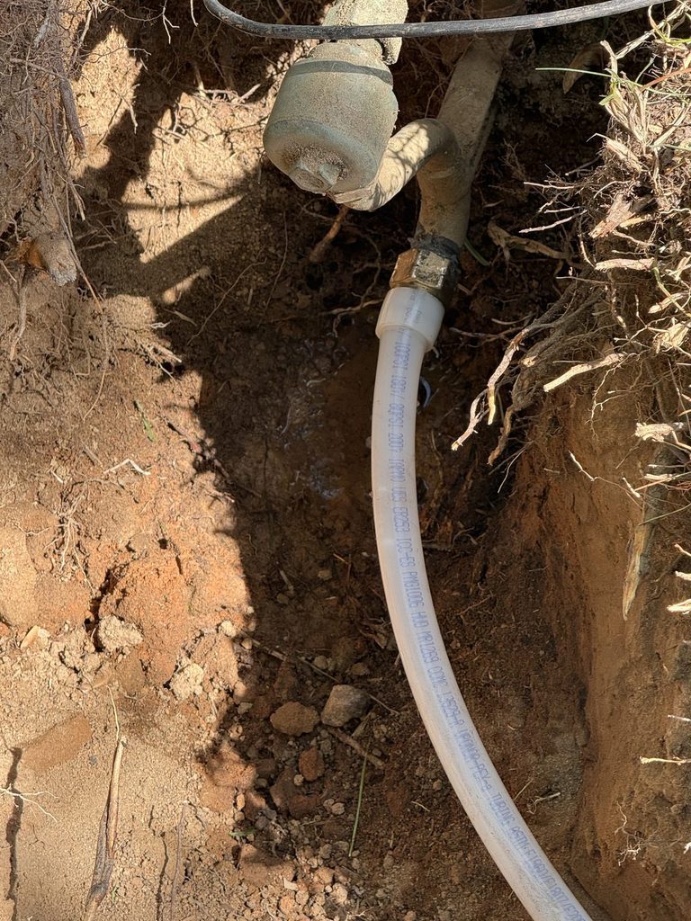 DETAIL — new PEX-A connected at the meter | New PEX-A water line connected at the water meter in Raleigh, NC