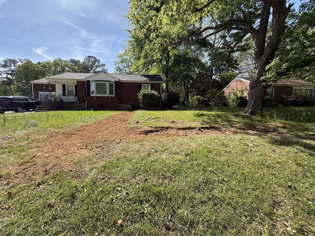 AFTER — finished front yard | Front yard after a water line replacement by ARC Plumbing in Raleigh, NC